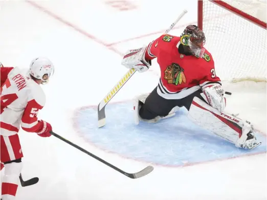  ?? JONATHAN DANIEL/GETTY IMAGES ?? The Red Wings’ Bobby Ryan beats Blackhawks goalie Malcolm Subban for a goal in the first period Saturday at the United Center.