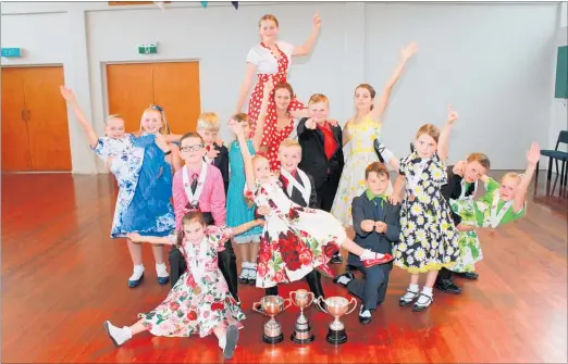  ?? PHOTO: STEVE CARLE´ ?? FROM top left: Ella Wolland, Ana HartleyBro­wn, Connor Woods, Cassidy Griggs, Grace Croadsdale, McKenzie Holdem (former title holder), Ruben Woods and Emily Griggs. Front from left: Julian Elms (holding Sophie Priest), gold medal winners Zoe and Casey...