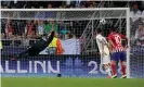  ?? Photograph: Maxim Shemetov/Reuters ?? Atlético Madrid’s Saúl Ñíguez (not pictured)gave Real Madrid’s Keylor Navas no chanceas he fired home his side’s third goal.