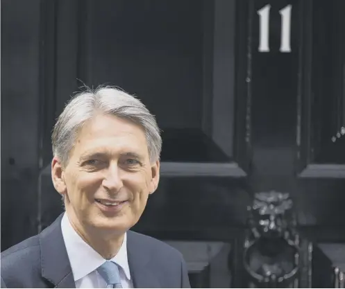  ??  ?? 0 Chancellor Philip Hammond has been urged to revisit predecesso­r George Osborne’s rejection of a recommenda­tion to improve regulation