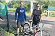  ?? STEPHEN HUDAK/STAFF ?? Daniel Gutierrez and his wife, Diana Martinez, welcome Oakland’s plan for an upgraded trail stop on the West Orange Trail.