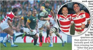  ??  ?? World Cup shocker: Ruan Pienaar watches on as South Africa team-mate Victor Matland knocks on during the Springboks surprise defeat by Japan in the 2015 World Cup