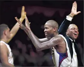  ?? Rick Loomis Los Angeles Times ?? JAMAL CRAWFORD, center, who can leave Clippers as a free agent, wants to stay. “To break through with this core group would mean everything,” he says.