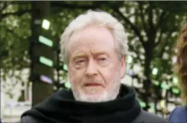  ?? PHOTO BY JOEL RYAN — INVISION — AP, FILE ?? In this file photo, director Ridley Scott appears at the premiere of the film “Alien: Covenant” in London. Scott decided to replace Kevin Spacey in the role of oil tycoon J. Paul Getty in his upcoming, already completed film “All the Money in the World.”