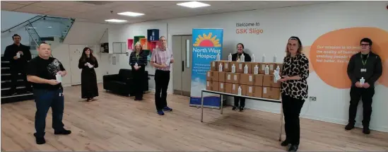  ??  ?? GSK staff presenting the hand sanitisers: Eugene McHenry, Karl Keenan, Alicia Finan, Maresa Harte, Russell Macpherson, Louise Scanlon, Mary Forte (North West Hospice) and Brian Moynihan.