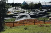  ??  ?? The new pumptrack at Ramsay Park winds around 20,000 square feet near Harkins Slough Road in Watsonvill­e.