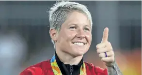  ??  ?? Canada’s captain Jen Kish celebrates after winning the bronze medal in women’s rugby sevens at the 2016 Summer Olympics. Kish is not happy about World Rugby’s decision to ban writing on athletic tape during games.