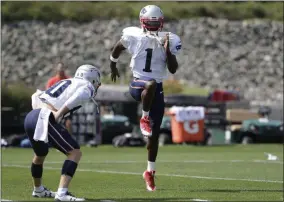  ?? STEVEN SENNE - THE ASSOCIATED PRESS ?? New England Patriots wide receiver Antonio Brown (1) works out near wide receiver Gunner Olszewski, left, during an NFL football practice, Wednesday, Sept. 11, 2019, in Foxborough, Mass.