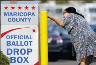  ?? MATT YORK - THE ASSOCIATED PRESS FILE ?? A drop box Nov. 7in Mesa, Ariz. Voting proceeded smoothly across most of the U.S.