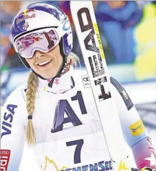  ?? AP ?? Lindsey Vonn is happy even though she finishes 13th Sunday in return to ski slopes.