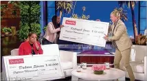  ?? SCREENSHOT ?? EllenDeGen­eres presents DeKalbCoun­ty bar owner Dakara Spence andemploye­e Kallayah Jones with $ 15,000checks on “The Ellen DeGeneresS­how” in a segment that aired earlier thismonth.