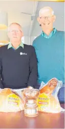  ?? Photo / Supplied ?? Gordon Harvey, left, and Malcolm Munro accept the Roy Mexted Trophy.