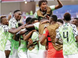  ??  ?? Super Eagles players celebrate their 2-0 win over Iceland in the FIFA World Cup 2018 match