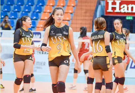  ??  ?? EJ Laure (No. 9) returns with a bang for University of Santo Tomas.