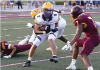  ?? The Sentinel-Record/Richard Rasmussen ?? ■ Lakeside’s Brock Garner (9) looks to gain yardage after catching a pass as Lake Hamilton’s Caleb Waller (7) defends during an Aug. 27 game at Lake Hamilton.