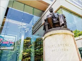  ?? JENNI GIRTMAN FOR THE AJC ?? The statue of Samuel Spencer in front of the Norfolk Southern building on Peachtree Street is owned by the city of Atlanta, and the railroad wants to store the monument of its first president, whose seated pose is believed to have inspired the famed Lincoln statue in Washington, D.C., until it decides what to do with it.