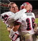  ?? AP 1996 ?? South Carolina interim coach Mike Bobo and UGA coach Kirby Smart were teammates and roommates while playing for the Bulldogs in the 1990s.