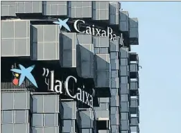  ?? NACHO DOCE / REUTERS ?? La seu operativa de CaixaBank a Barcelona