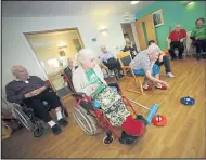  ??  ?? Residents at Edinburgh’s care homes warm up for next month’s Olympics by taking part in their own mini games