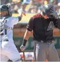  ??  ?? Jake Lamb reacts after striking out Sunday. The Diamondbac­ks are hitting .211 as a team this season.