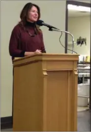  ?? JORDANA JOY — MORNING JOURNAL ?? Paula McLain speaks at The Friends of Amherst Public Library’s annual author lunch on Oct. 18 at Heritage Presbyteri­an Church, 515 N. Leavitt Road in Amherst.