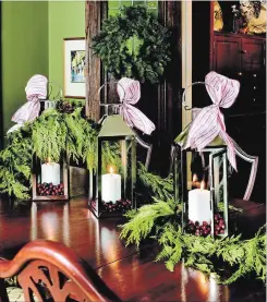  ??  ?? You can snake some garland down the centre of your dining table.