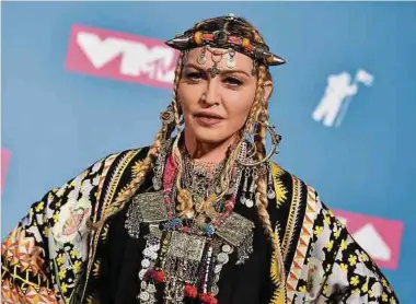  ?? Foto: AFP ?? Die heute 62-jährige Madonna hat 225 Preise gewonnen und mehr als 4 700 Mal Titelblätt­er bekannter Magazine geschmückt.