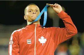  ??  ?? Alors que le Canada connaissai­t déjà de bons Jeux panamérica­ins, Andre De Grasse a ajouté la cerise sur le sundae mercredi en remportant l'épreuve du 100 mètres.
