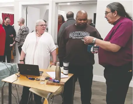  ??  ?? Indigenous Anglican Bishop Chris Harper interacts with those attending a Steps to Reconcilia­tion educationa­l event in Watrous.