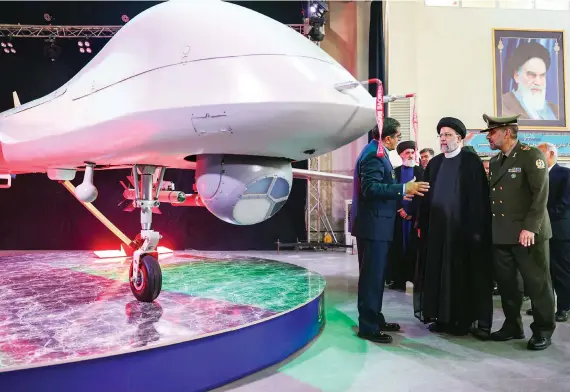  ?? AFP ?? By 2021, following a rash of attacks in the Middle East, it was clear that Iranian drone technology, main, below and bottom, was in the hands of non-state actors and militias in Iraq, Yemen, Lebanon and Syria.