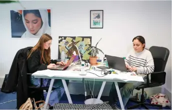  ?? — AFP photos ?? Staff members work to prepare the talk shows for Begum TV, an educationa­l television channel aimed at a demographi­c of middle and high school girls deprived of education by the Taliban authoritie­s since August 2021, in Paris.