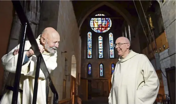  ?? ?? BUSY TIME: Father Giles, left, and Father Michael of Pluscarden Abbey will be decorating on Christmas Eve with nativity cribs and greenery.