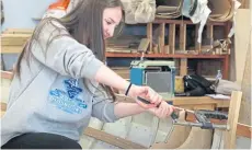  ?? ?? A pupil at work in the Plockton boat-building project.