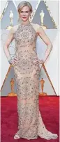  ?? Jordan Strauss photos / Associated Press ?? Nicole Kidman shines in Armani Privè.