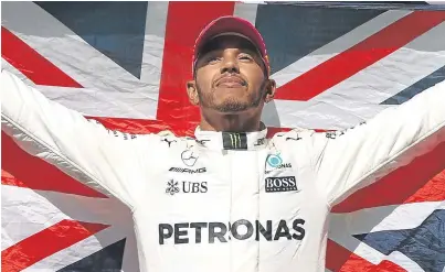  ?? Picture: Getty Images. ?? Lewis Hamilton celebrates his win in Austin on Sunday, leaving him on the brink of a fourth F1 world title.