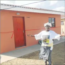  ?? Picture: SIKHO NTSHOBANE ?? ELATED: Mthatha pensioner Nothaweni Mantente, 70, stands in front of her new RDP house given to her by KSD municipal bosses on Friday. She was among 40 former shack dwellers given keys to their own houses as part of a government project