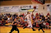  ??  ?? ARIZONA WESTERN’S ALFONSO PLUMMER makes a layup during Friday’s game against Howard in the Desert Classic at AWC.