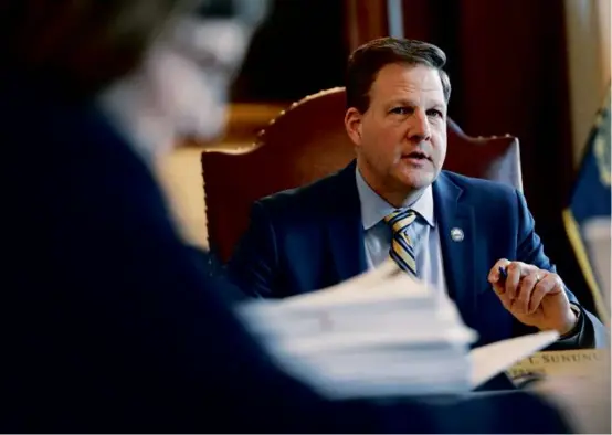  ?? CHERYL SENTER FOR THE BOSTON GLOBE ?? Governor Chris Sununu’s e-mail and document retention and disposal policy tells staffers to delete e-mails, texts, documents, drafts, and memos within 30 days unless they “may potentiall­y be responsive to a pending Right to Know request.”