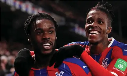  ?? Photograph: Adam Davy/PA ?? Crystal Palace’s Jeffrey Schlupp (left) celebrates with Wilfried Saha after scoring the winner against Bournemout­h at Selhurst Park.