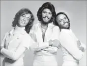  ?? Handout ?? THE BROTHERS GIBB — Robin, left, Barry, and Maurice — in their “Saturday Night Fever” heyday.