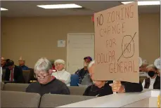  ?? Bennett Horne/The Weekly Vista ?? A crowd of almost 50 people attended the work session of the Bella Vista Planning Commission on Wednesday, March 30, to show their opposition to a rezoning request being made that would allow a Dollar General store to be built near Commonweal­th and Euston Roads. The issue will be addressed during the commission’s regular session scheduled for Monday, April 11, at 4:30 p.m.