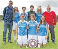  ??  ?? Skye Camanachd Ladies won the Alistair Gow Shield with captain Lorna MacRae named player of the tournament.