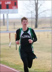  ?? PHOTOS BY COURTESY PHOTO — OTSPORTSCH­EK ?? A Fleming athletes makes his way around the track during the Yuma Early Qualifier March 23, 2024.