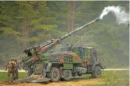  ?? AP PHOTO/SERGEI GRITS ?? French soldiers fire a French-made CAESAR self-propelled howitzer May 25 during the Spring Storm 2023 military drills, the largest annual exercise of Estonian Defence Forces, near Tapa, Estonia.