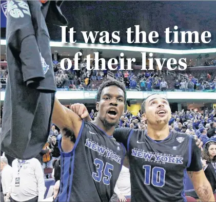  ?? AP PHOTO ?? Buffalo’s Xavier Ford (35) and Jarryn Skeete celebrate after the Bulls defeated Central Michigan 89-84 in the championsh­ip of the NCAA Mid-american Conference tournament in 2015. Teammates in college, the two are now members of the National Basketball...