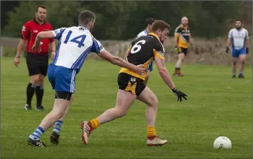  ??  ?? Paul Browne of Kilrush gets to the ball before Craanford’s Shane Greene in the Enniscorth­y Farm Systems Gorey District Junior ‘B’ football championsh­ip final in Camolin on Friday.