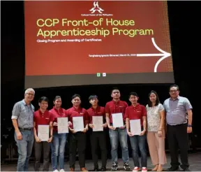  ?? ?? The graduates of the CCP Apprentice­ship Program with PED Head Ariel Yonzon (leftmost), VOD Chief Jocel Pacada (second from right), and CCP Artistic Director Dennis Marasigan (rightmost)