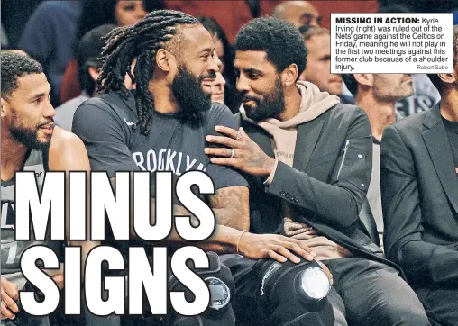  ?? Robert Sabo ?? MISSING IN ACTION: Kyrie Irving (right) was ruled out of the Nets’ game against the Celtics on Friday, meaning he will not play in the first two meetings against this former club because of a shoulder injury.