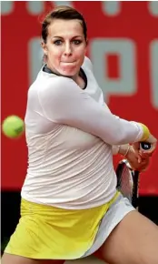  ?? — AP ?? Russia’s Anastasia Pavlyuchen­kova lines up a return to Israel’s Shahar Peer during their first round match at the Portugal Open in Oeiras on Tuesday. Pavlyuchen­kova won 6-4, 6-4.