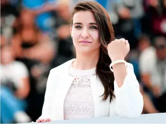  ??  ?? Syrian director Waad Al-Kateab poses during a photocall at the 72nd edition of the Cannes Film Festival in France.